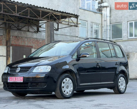 Чорний Фольксваген Туран, об'ємом двигуна 1.6 л та пробігом 194 тис. км за 7499 $, фото 1 на Automoto.ua