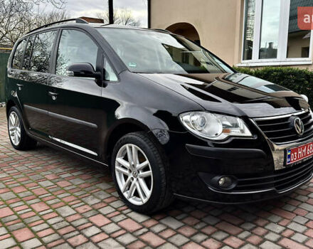 Черный Фольксваген Туран, объемом двигателя 1.6 л и пробегом 176 тыс. км за 8198 $, фото 1 на Automoto.ua