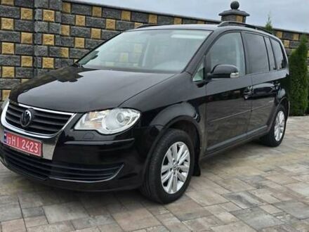 Фольксваген Туран 2008 в Сарнах на Automoto.ua Черный Фольксваген Туран, объемом двигателя 1.6 л и пробегом 242 тыс. км за 6700 $, фото 1 на Automoto.ua