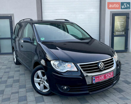 Чорний Фольксваген Туран, об'ємом двигуна 2 л та пробігом 292 тис. км за 8999 $, фото 1 на Automoto.ua