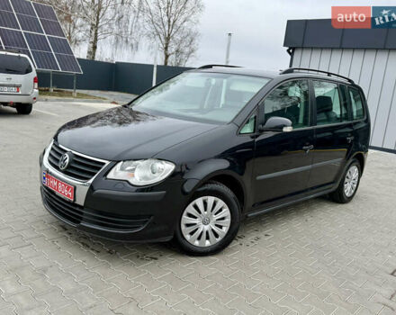 Чорний Фольксваген Туран, об'ємом двигуна 1.4 л та пробігом 227 тис. км за 7200 $, фото 1 на Automoto.ua
