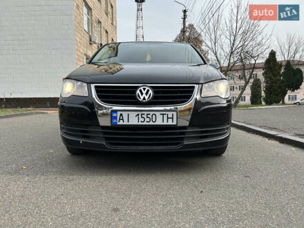 Черный Фольксваген Туран, объемом двигателя 1.4 л и пробегом 192 тыс. км за 7500 $, фото 1 на Automoto.ua