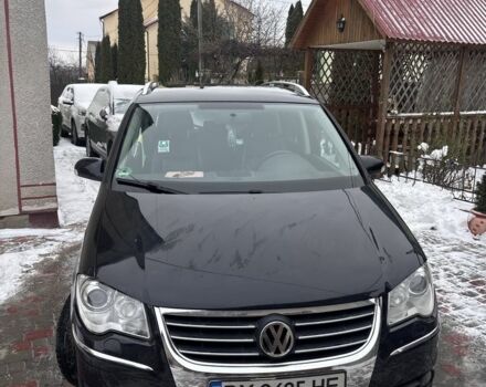 Черный Фольксваген Туран, объемом двигателя 1.4 л и пробегом 281 тыс. км за 6700 $, фото 1 на Automoto.ua