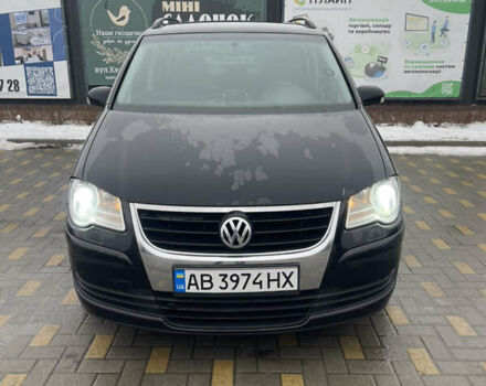 Чорний Фольксваген Туран, об'ємом двигуна 1.39 л та пробігом 236 тис. км за 7000 $, фото 1 на Automoto.ua