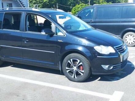 Чорний Фольксваген Туран, об'ємом двигуна 1.39 л та пробігом 220 тис. км за 6800 $, фото 1 на Automoto.ua