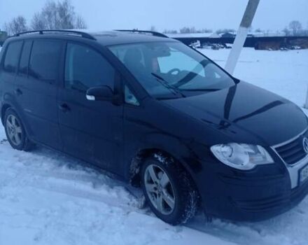 Чорний Фольксваген Туран, об'ємом двигуна 1.9 л та пробігом 300 тис. км за 8500 $, фото 1 на Automoto.ua