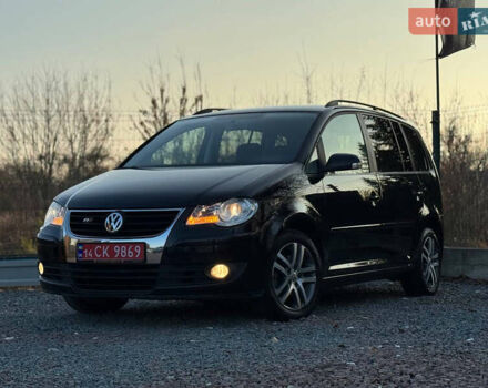 Чорний Фольксваген Туран, об'ємом двигуна 1.6 л та пробігом 215 тис. км за 7490 $, фото 1 на Automoto.ua