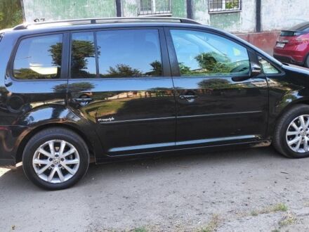 Фольксваген Туран 2009 в Кривом Роге на Automoto.ua Черный Фольксваген Туран, объемом двигателя 1.9 л и пробегом 275 тыс. км за 8000 $, фото 1 на Automoto.ua
