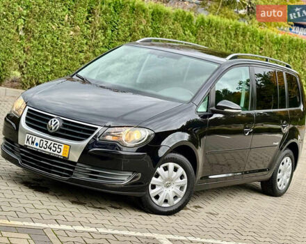 Черный Фольксваген Туран, объемом двигателя 1.4 л и пробегом 190 тыс. км за 7200 $, фото 1 на Automoto.ua