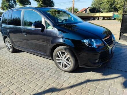 Черный Фольксваген Туран, объемом двигателя 1.9 л и пробегом 225 тыс. км за 7999 $, фото 1 на Automoto.ua