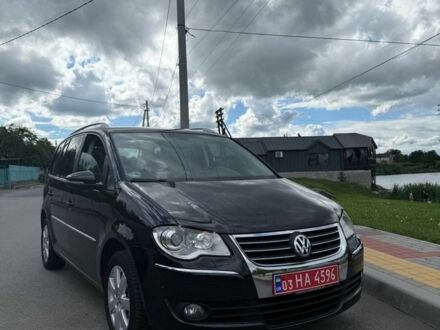 Фольксваген Туран 2009 у Белой Церкве на Automoto.ua Чорний Фольксваген Туран, об'ємом двигуна 1.4 л та пробігом 252 тис. км за 8350 $, фото 1 на Automoto.ua