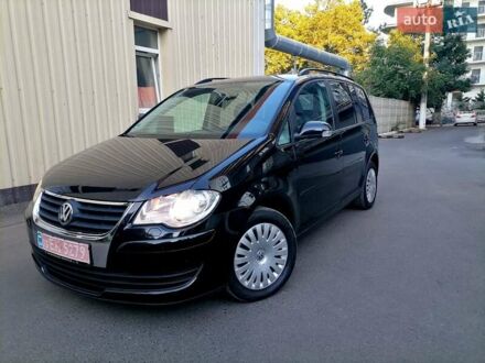 Черный Фольксваген Туран, объемом двигателя 1.4 л и пробегом 193 тыс. км за 6600 $, фото 1 на Automoto.ua