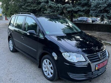 Чорний Фольксваген Туран, об'ємом двигуна 1.4 л та пробігом 172 тис. км за 6950 $, фото 1 на Automoto.ua