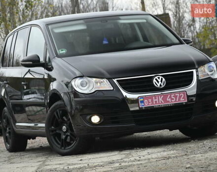 Черный Фольксваген Туран, объемом двигателя 1.6 л и пробегом 152 тыс. км за 7200 $, фото 1 на Automoto.ua