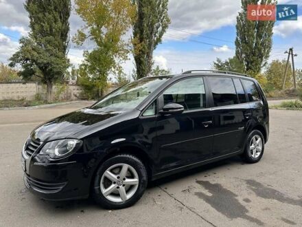 Фольксваген Туран 2009 в Кривом Роге на Automoto.ua Черный Фольксваген Туран, объемом двигателя 1.4 л и пробегом 237 тыс. км за 6850 $, фото 1 на Automoto.ua