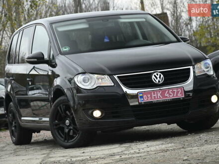 Черный Фольксваген Туран, объемом двигателя 1.6 л и пробегом 152 тыс. км за 7600 $, фото 1 на Automoto.ua