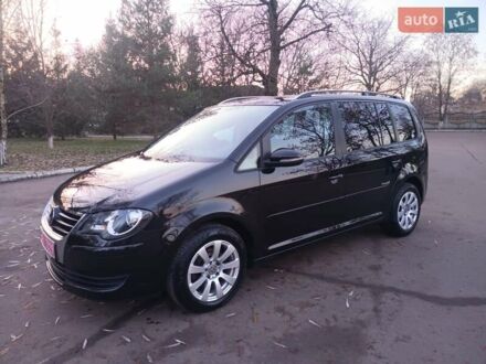 Чорний Фольксваген Туран, об'ємом двигуна 1.6 л та пробігом 176 тис. км за 8950 $, фото 1 на Automoto.ua