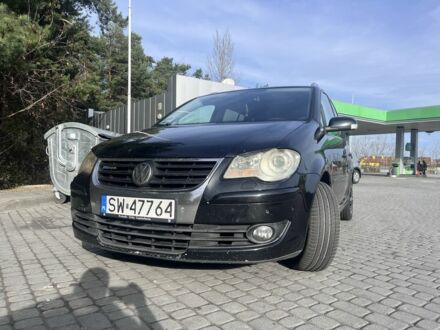 Черный Фольксваген Туран, объемом двигателя 0 л и пробегом 354 тыс. км за 3750 $, фото 1 на Automoto.ua