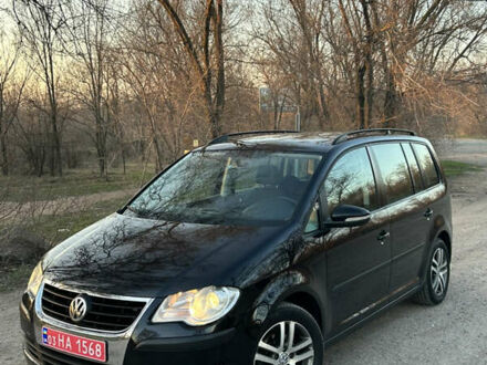 Фольксваген Туран 2010 у Вознесенске на Automoto.ua Чорний Фольксваген Туран, об'ємом двигуна 1.4 л та пробігом 263 тис. км за 7500 $, фото 1 на Automoto.ua