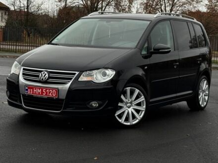 Черный Фольксваген Туран, объемом двигателя 2 л и пробегом 260 тыс. км за 9950 $, фото 1 на Automoto.ua