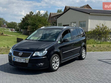 Фольксваген Туран 2010 у Кропивницькому (Кіровограді) на Automoto.ua Чорний Фольксваген Туран, об'ємом двигуна 1.97 л та пробігом 285 тис. км за 8600 $, фото 1 на Automoto.ua