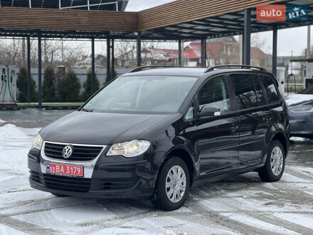 Чорний Фольксваген Туран, об'ємом двигуна 2 л та пробігом 202 тис. км за 7800 $, фото 1 на Automoto.ua