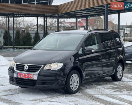 Чорний Фольксваген Туран, об'ємом двигуна 2 л та пробігом 202 тис. км за 7800 $, фото 1 на Automoto.ua