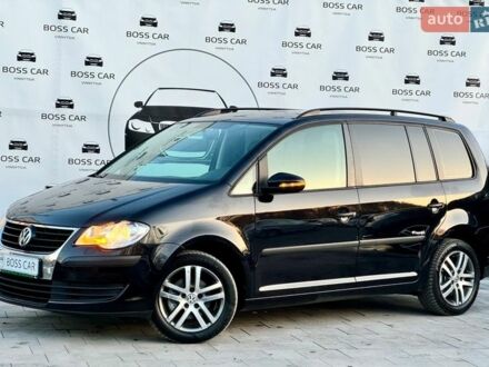 Чорний Фольксваген Туран, об'ємом двигуна 1.6 л та пробігом 209 тис. км за 9800 $, фото 1 на Automoto.ua