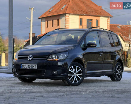 Чорний Фольксваген Туран, об'ємом двигуна 1.4 л та пробігом 187 тис. км за 6999 $, фото 1 на Automoto.ua