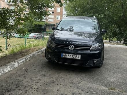 Черный Фольксваген Туран, объемом двигателя 1.4 л и пробегом 285 тыс. км за 10500 $, фото 1 на Automoto.ua
