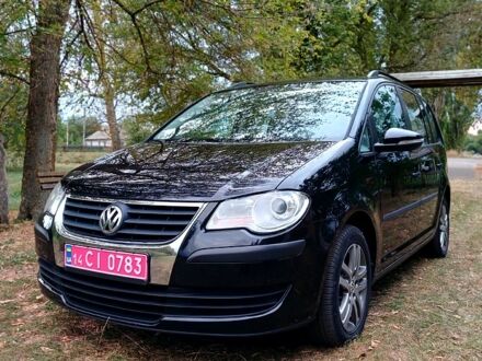 Чорний Фольксваген Туран, об'ємом двигуна 1.6 л та пробігом 249 тис. км за 8499 $, фото 1 на Automoto.ua