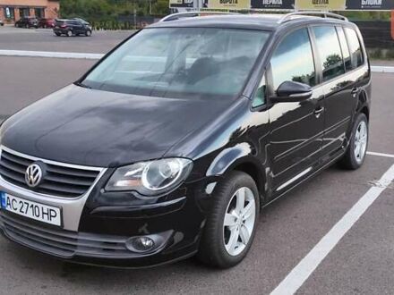 Фольксваген Туран 2010 в Луцке на Automoto.ua Черный Фольксваген Туран, объемом двигателя 1.39 л и пробегом 195 тыс. км за 8300 $, фото 1 на Automoto.ua