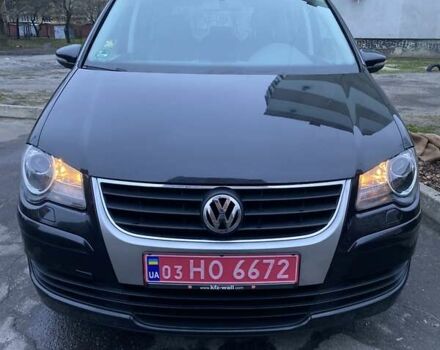 Черный Фольксваген Туран, объемом двигателя 2 л и пробегом 207 тыс. км за 8700 $, фото 1 на Automoto.ua