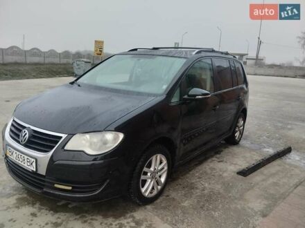 Фольксваген Туран 2010 в Дубровице на Automoto.ua Черный Фольксваген Туран, объемом двигателя 1.39 л и пробегом 290 тыс. км за 5500 $, фото 1 на Automoto.ua
