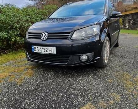 Черный Фольксваген Туран, объемом двигателя 1.6 л и пробегом 208 тыс. км за 9500 $, фото 1 на Automoto.ua