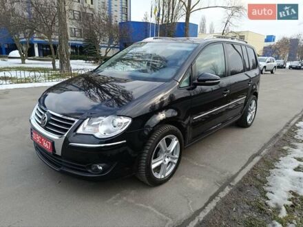 Фольксваген Туран 2010 у Києві на Automoto.ua Чорний Фольксваген Туран, об'ємом двигуна 1.4 л та пробігом 195 тис. км за 8900 $, фото 1 на Automoto.ua