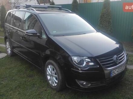 Черный Фольксваген Туран, объемом двигателя 1.39 л и пробегом 207 тыс. км за 7788 $, фото 1 на Automoto.ua