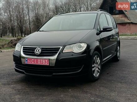 Черный Фольксваген Туран, объемом двигателя 1.6 л и пробегом 249 тыс. км за 7999 $, фото 1 на Automoto.ua