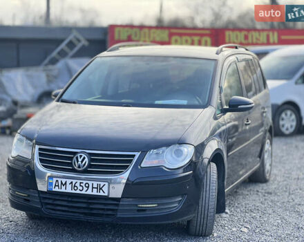 Черный Фольксваген Туран, объемом двигателя 1.4 л и пробегом 290 тыс. км за 6900 $, фото 1 на Automoto.ua