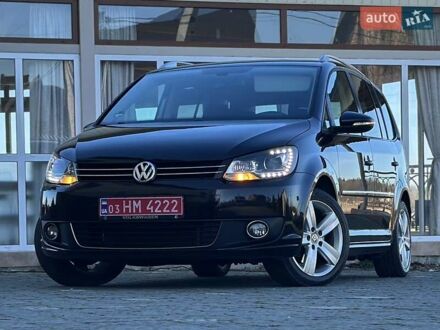 Черный Фольксваген Туран, объемом двигателя 2 л и пробегом 250 тыс. км за 11750 $, фото 1 на Automoto.ua