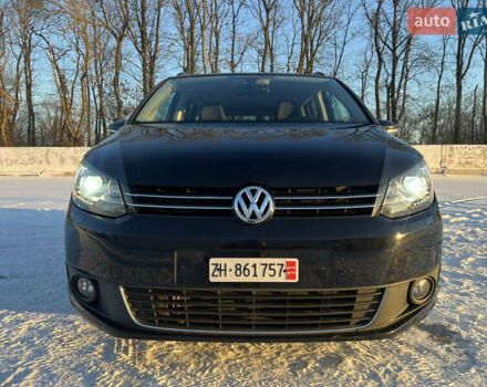 Черный Фольксваген Туран, объемом двигателя 1.4 л и пробегом 233 тыс. км за 8900 $, фото 1 на Automoto.ua