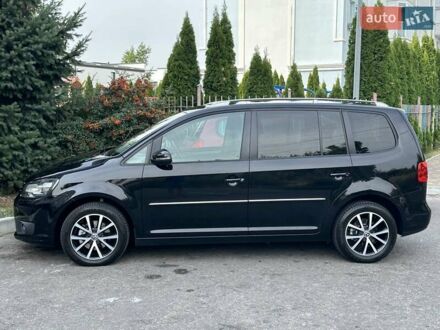 Чорний Фольксваген Туран, об'ємом двигуна 1.97 л та пробігом 276 тис. км за 12990 $, фото 1 на Automoto.ua