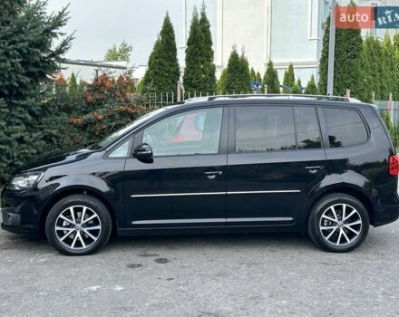 Чорний Фольксваген Туран, об'ємом двигуна 1.97 л та пробігом 276 тис. км за 12990 $, фото 1 на Automoto.ua