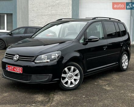 Черный Фольксваген Туран, объемом двигателя 1.6 л и пробегом 296 тыс. км за 9999 $, фото 1 на Automoto.ua