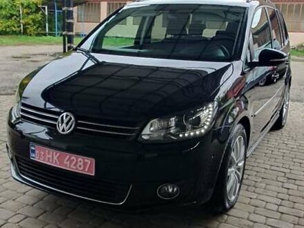 Черный Фольксваген Туран, объемом двигателя 1.98 л и пробегом 255 тыс. км за 12400 $, фото 1 на Automoto.ua