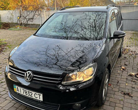 Черный Фольксваген Туран, объемом двигателя 1.39 л и пробегом 99 тыс. км за 11399 $, фото 1 на Automoto.ua