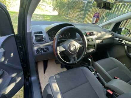 Черный Фольксваген Туран, объемом двигателя 1.6 л и пробегом 375 тыс. км за 9200 $, фото 1 на Automoto.ua