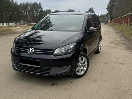 Черный Фольксваген Туран, объемом двигателя 1.97 л и пробегом 269 тыс. км за 11000 $, фото 1 на Automoto.ua