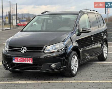 Черный Фольксваген Туран, объемом двигателя 1.4 л и пробегом 227 тыс. км за 8950 $, фото 1 на Automoto.ua