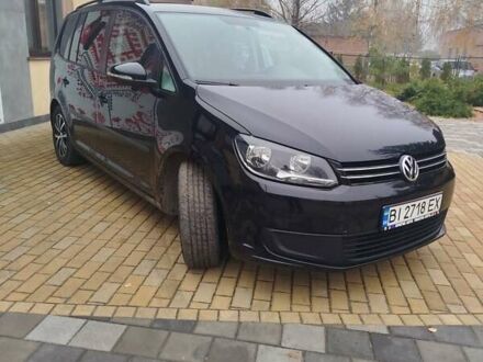 Черный Фольксваген Туран, объемом двигателя 1.6 л и пробегом 238 тыс. км за 9600 $, фото 1 на Automoto.ua